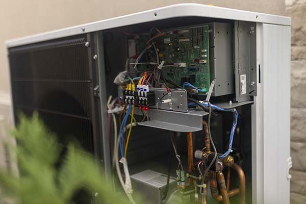 Professional heat pump repair service for a residential HVAC system
